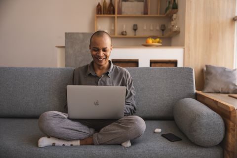 Men working at home with laptop