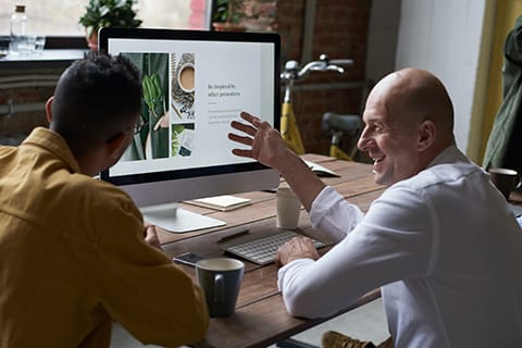 Two people collaborating on a project