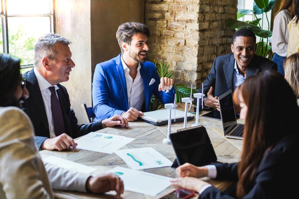 Team of multigenerational business people working together